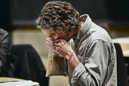 Evan Craine evaluates malt at the 2019 Malt Cup