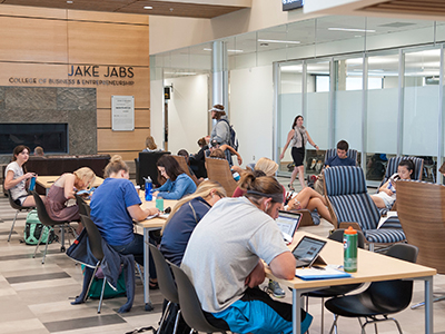 Students study around a table in Jabs Hall