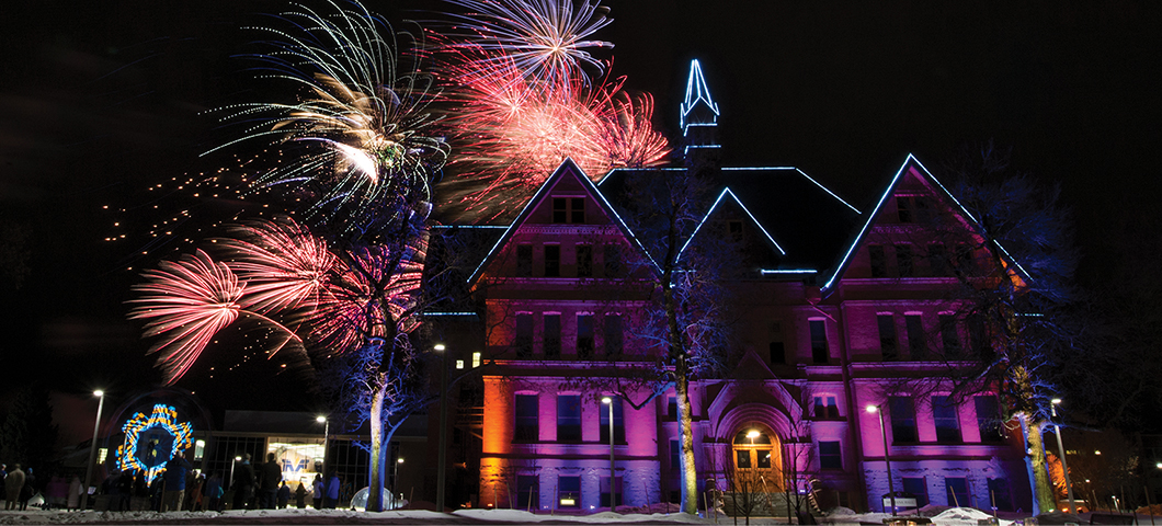 Fireworks behind Montana Hall during the 125th anniversary celebration.