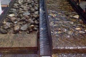 Flumes used to manipulate drying in a river