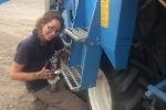 PhD student Traci Hoogland works on maintaining field equipment