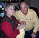 Jim Alderson, pictured here with his wife, Connie, and grandson, Max