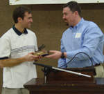 Scott Bryant, Director of the Center for Entrepreneurship, presents keynote speaker, Jeff Riggs