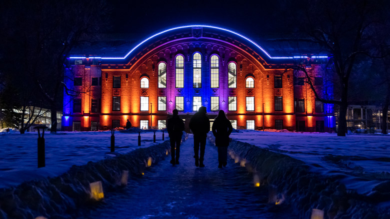 Shot of Romney Hall lit up during Montana State’s annual Montana Hall lighting celebration 
