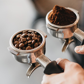 picture of espresso beans and ground espresso