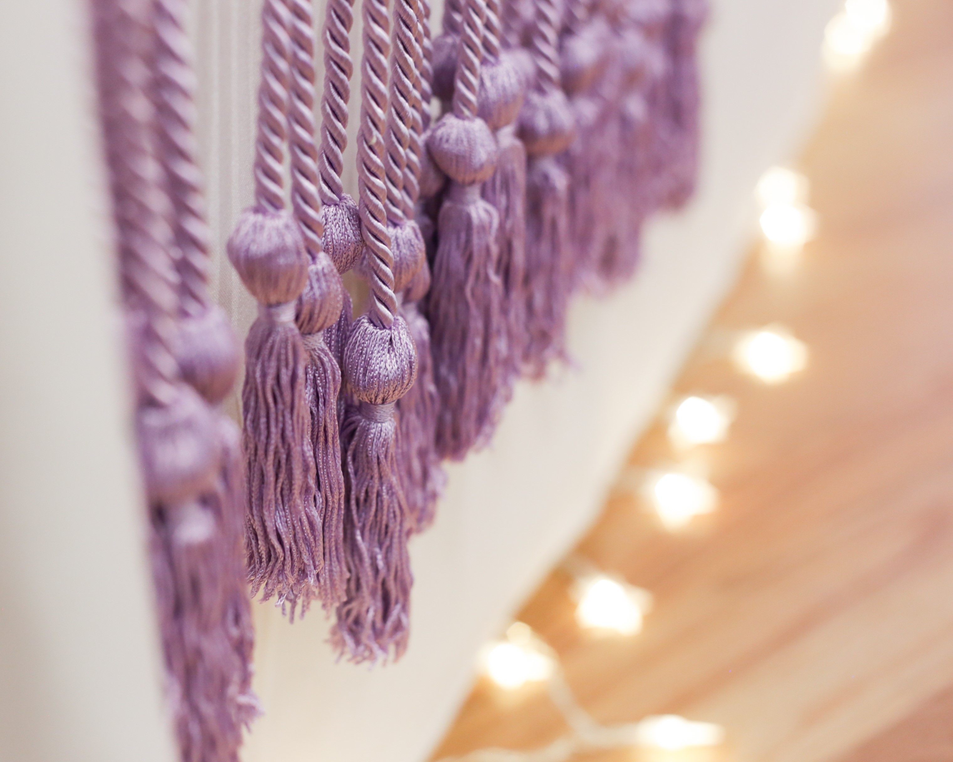 lavender cords hanging off the side of a table