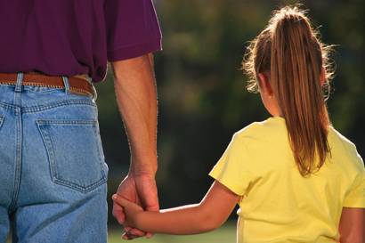 Father and Daughter Holding Hands