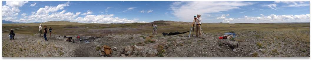 Paleontologists using survey equipment in eastern Montana