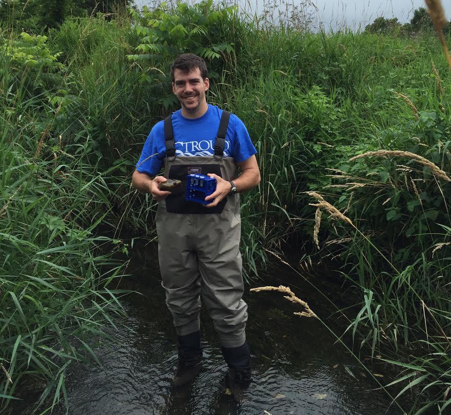 Ben wading in stream