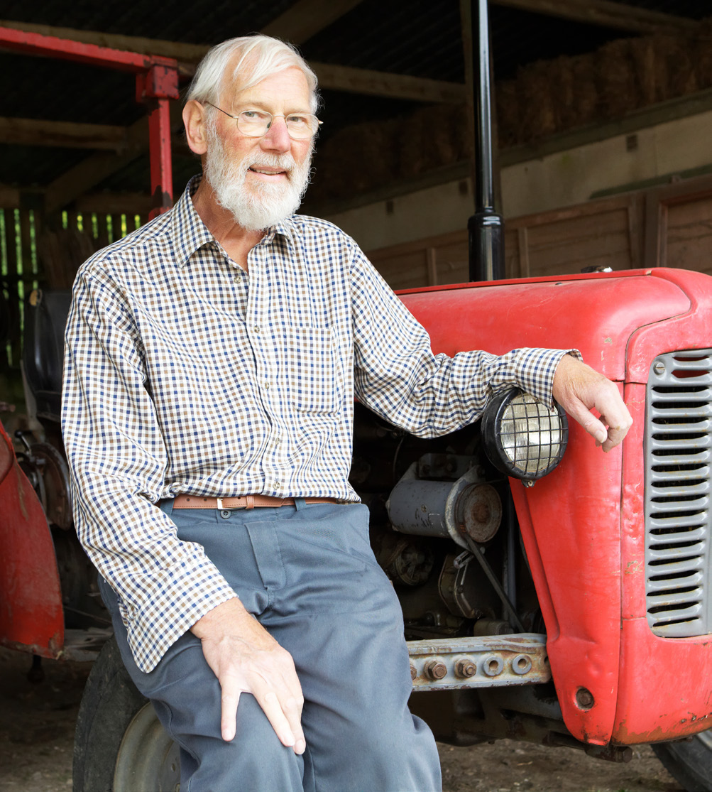 Elderly Man with Tractor