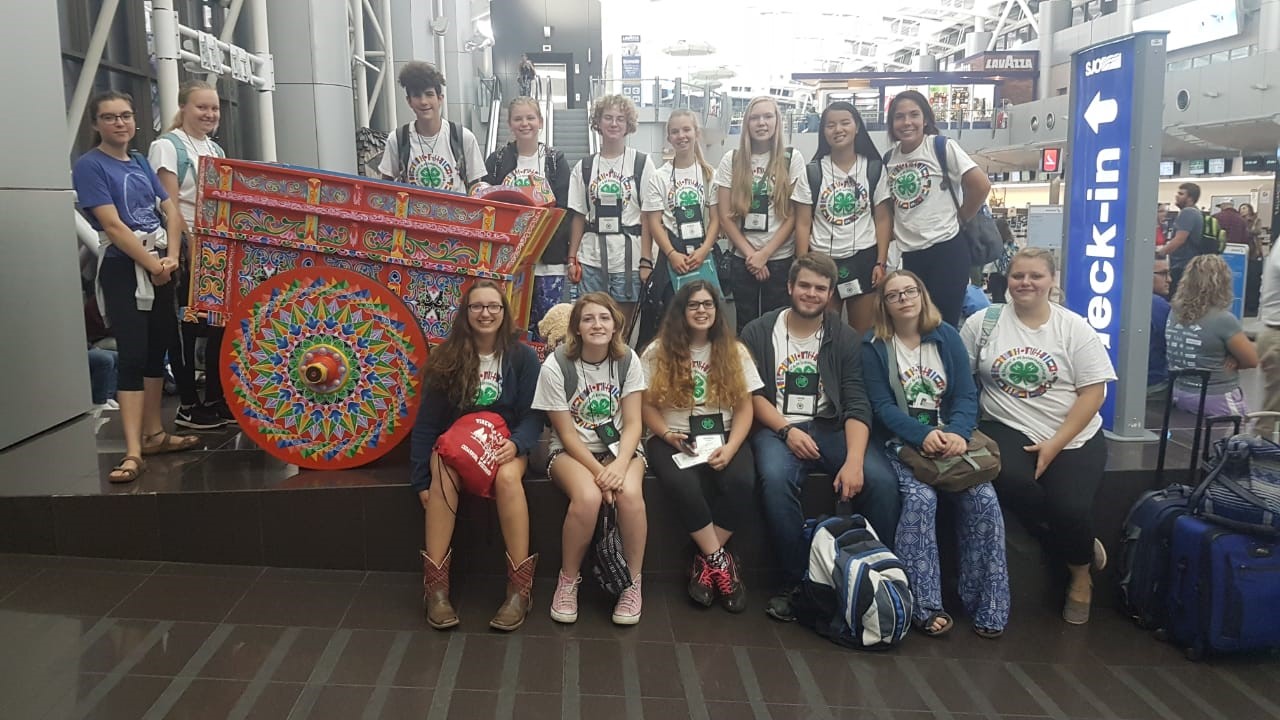 Costa Rica Delegates at the airport in States 4-H t-shirts