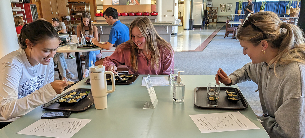 volunteer participants evaluate samples of lentil couscous