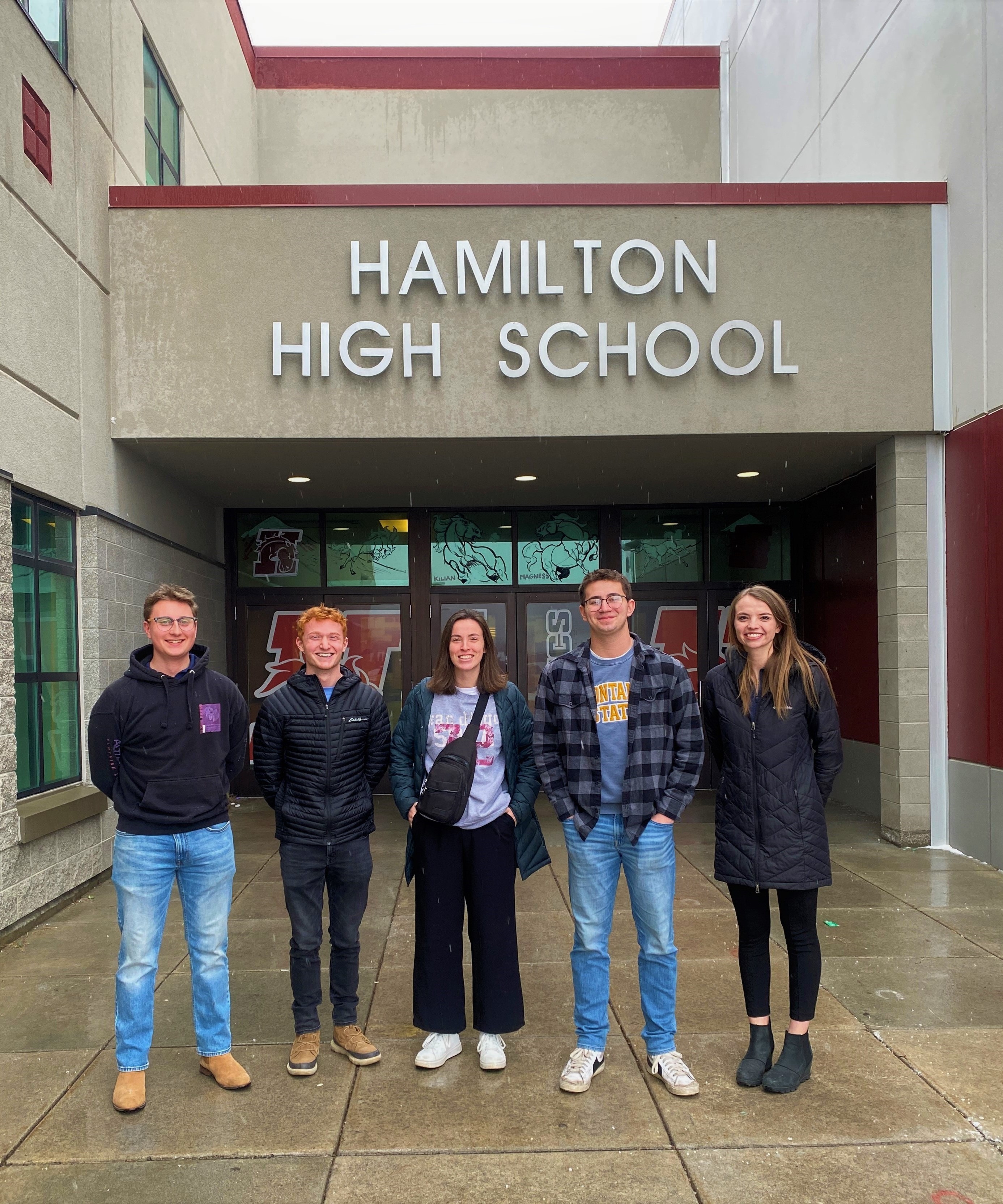 students stand in front of Hamilton High School
