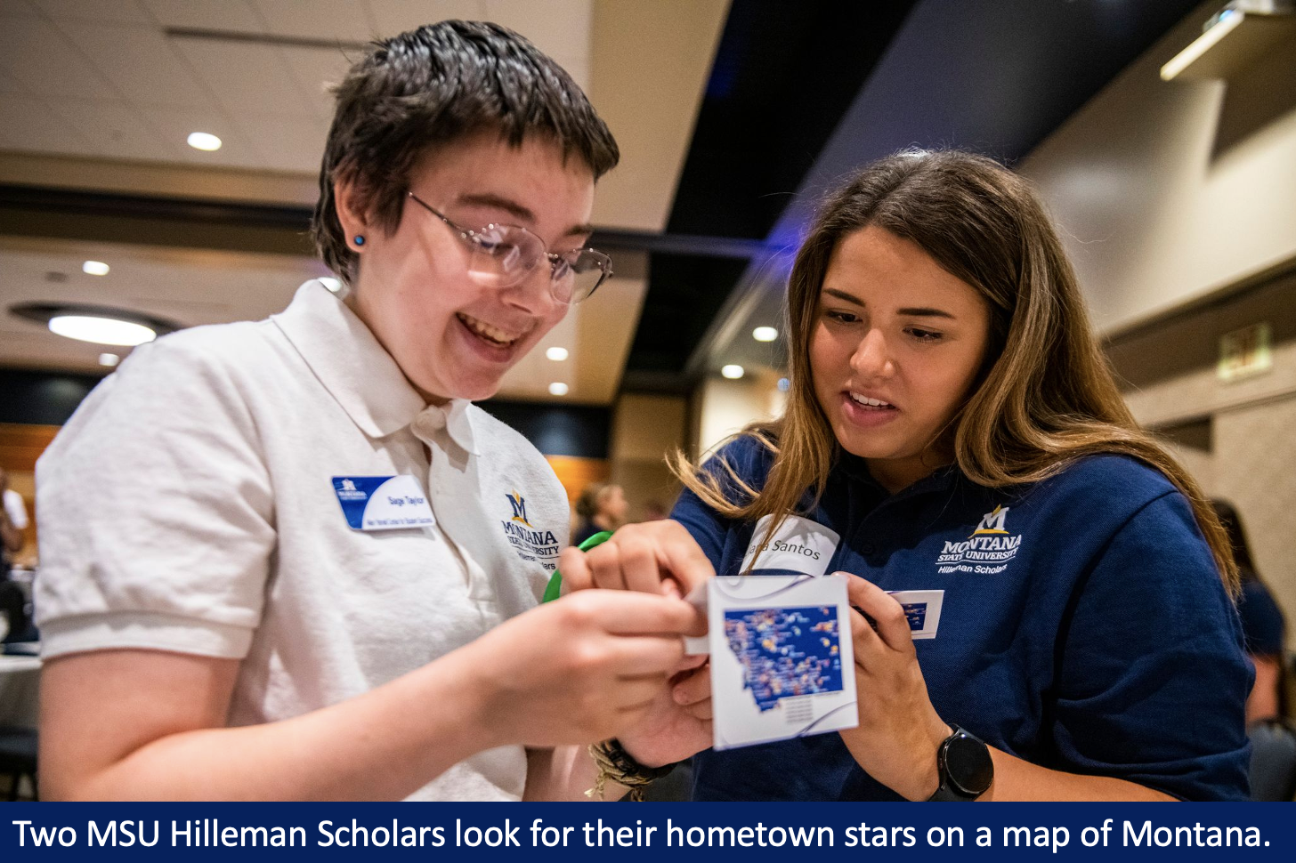 Students look for their hometowns on a map