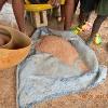 040 - Awa Diarra prepares sorghum couscous (locally known as tow/toe) for dinner