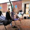 047 - Keriba Coulibaly (left) chilling out in 100+ degrees F. shade