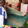 003 - Shopping for cloth to make a Mali dress for Wendy. Florence in one of her dresses