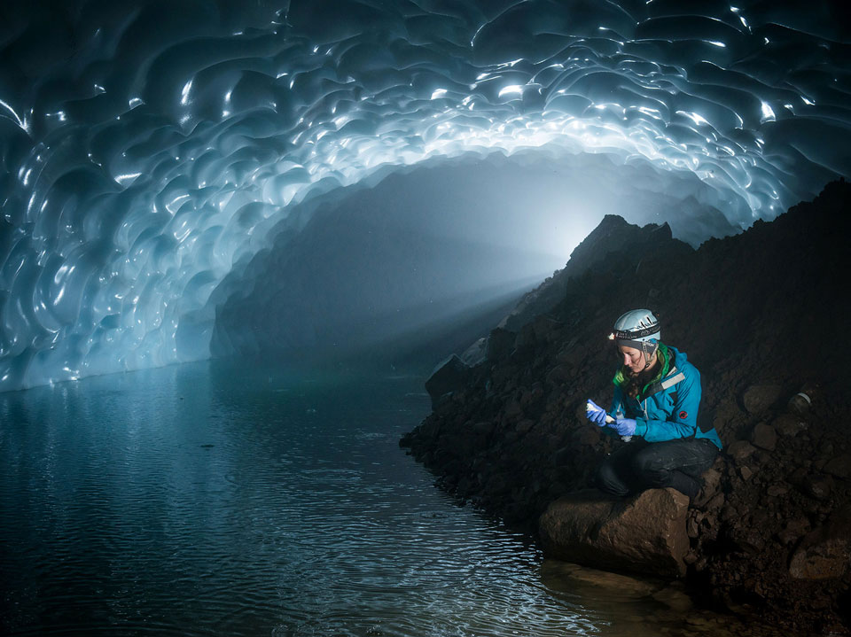 Zoe Harrold inside a large ice cave