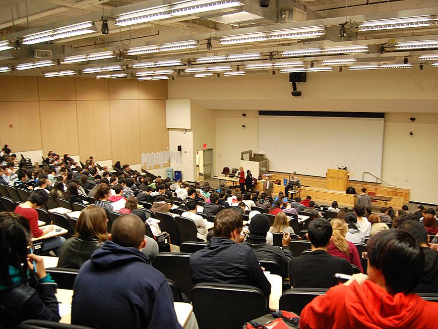 Large lecture hall filled with students