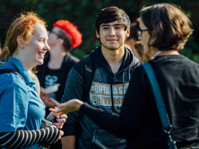 Students conversing at the MSU ice cream social
