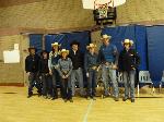 Rodeo team posing in school gym