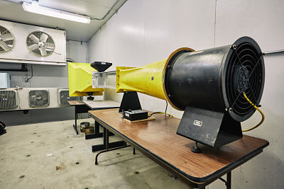 shot of the yellow wind tunnel machine in cold lab