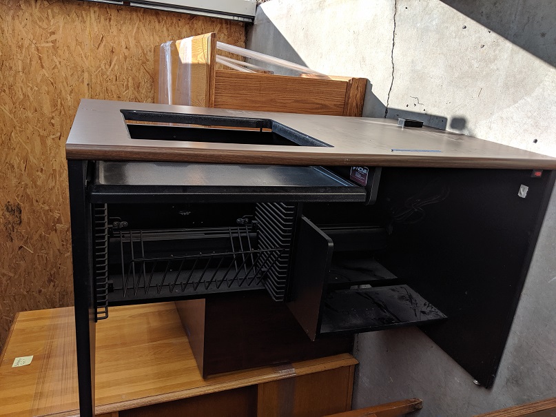 dark brown desk with glass insert on top