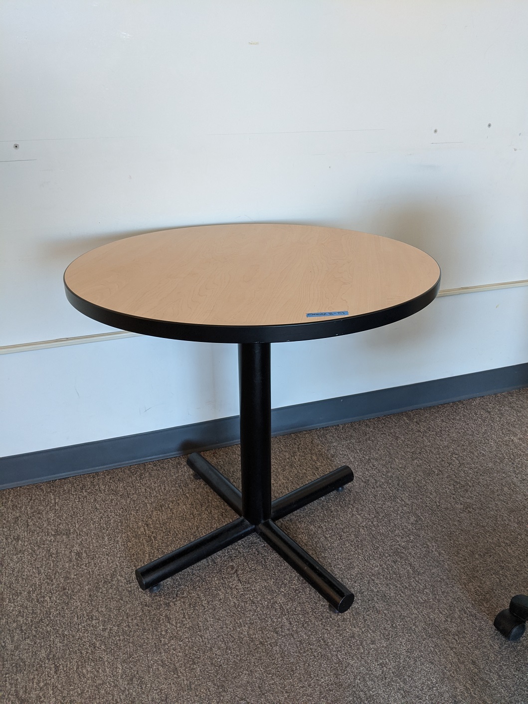 Small round wood look table