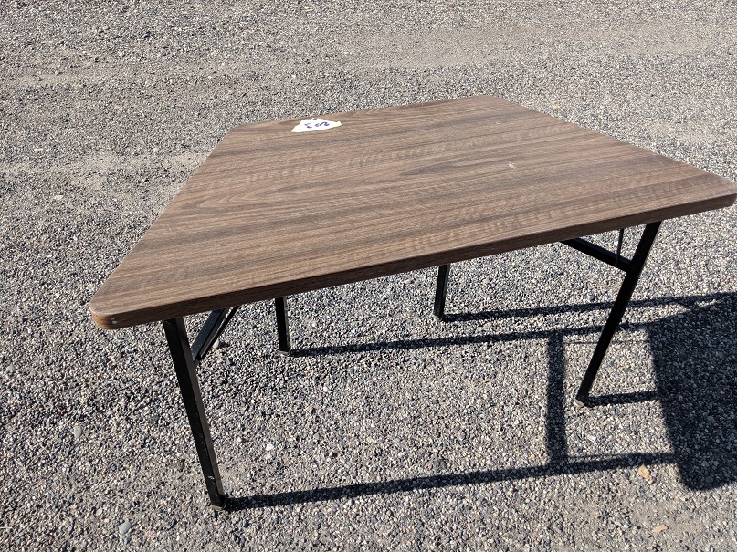 Brown trapezoid table with metal legs