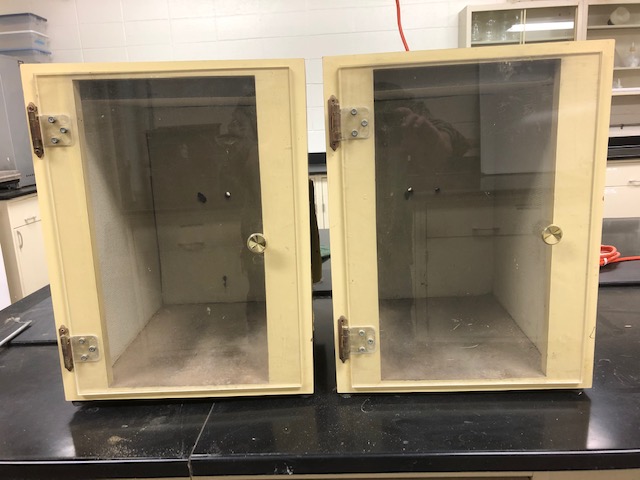 two tan small soundproof cabinets
