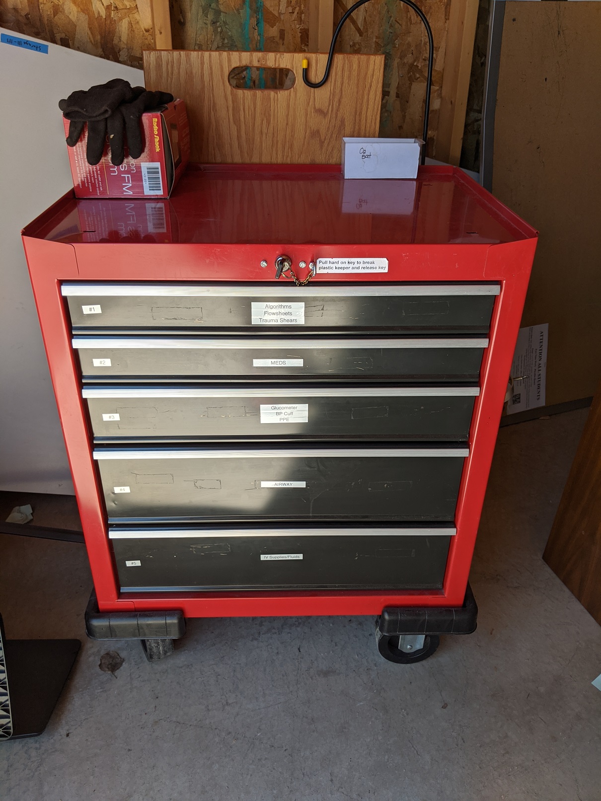 Red metal rolling toolbox