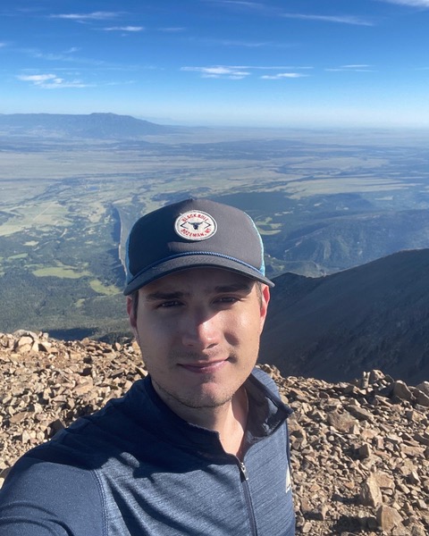 Dillon Klueber Selfie with Mountains Behind