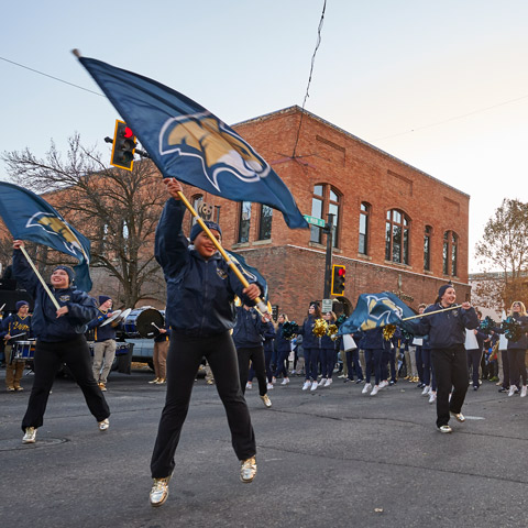 MSU celebrating the Homecoming Parade in downtown Bozeman