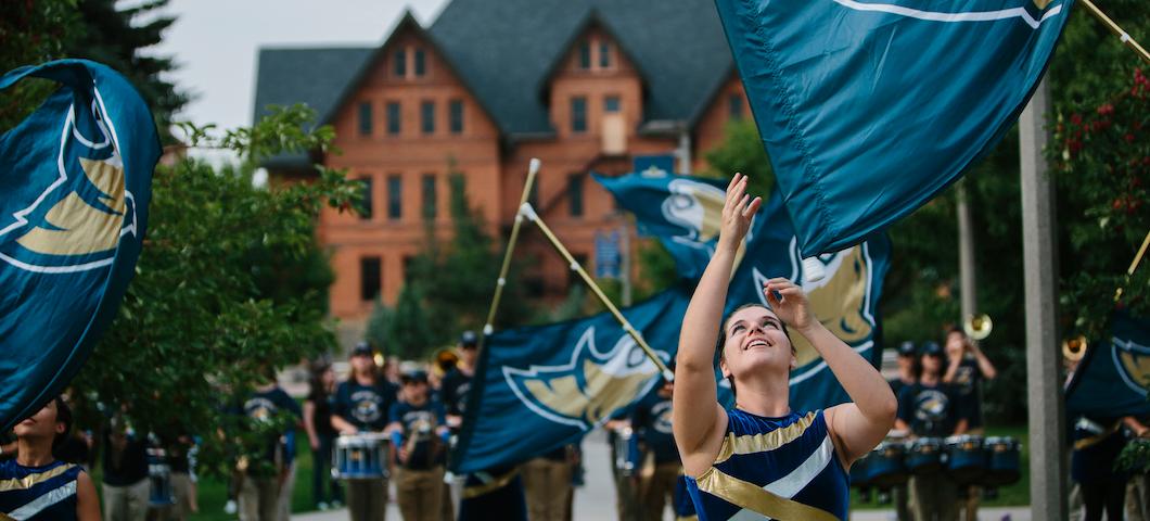 The Montana State Color Guard celebrates MSU Debut outside Montana Hall