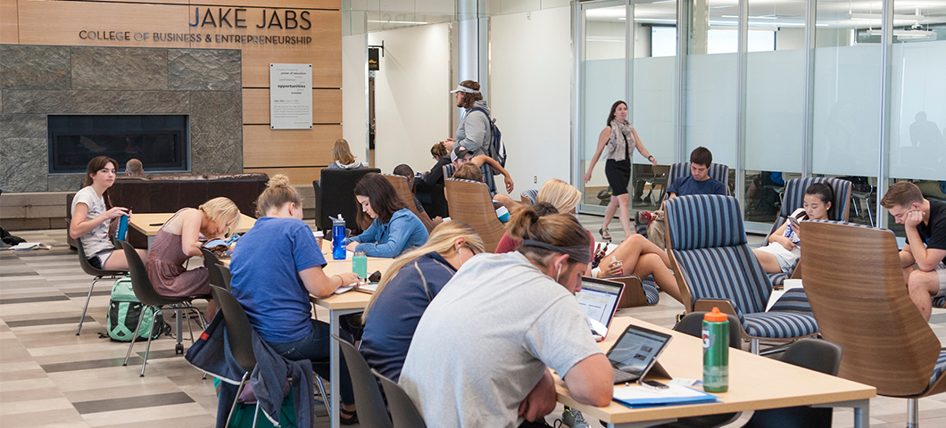 Students work on homework in the lobby of Jabs Hall.