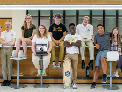 Group photo of Hilleman scholars in building lobby.