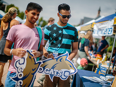 Two students signing up for a club