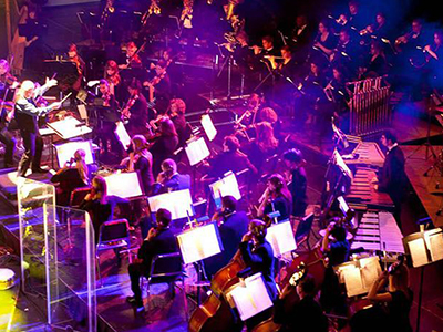 An ensemble performs at a concert.