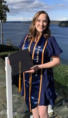 Kayla Hay poses for graduation photo