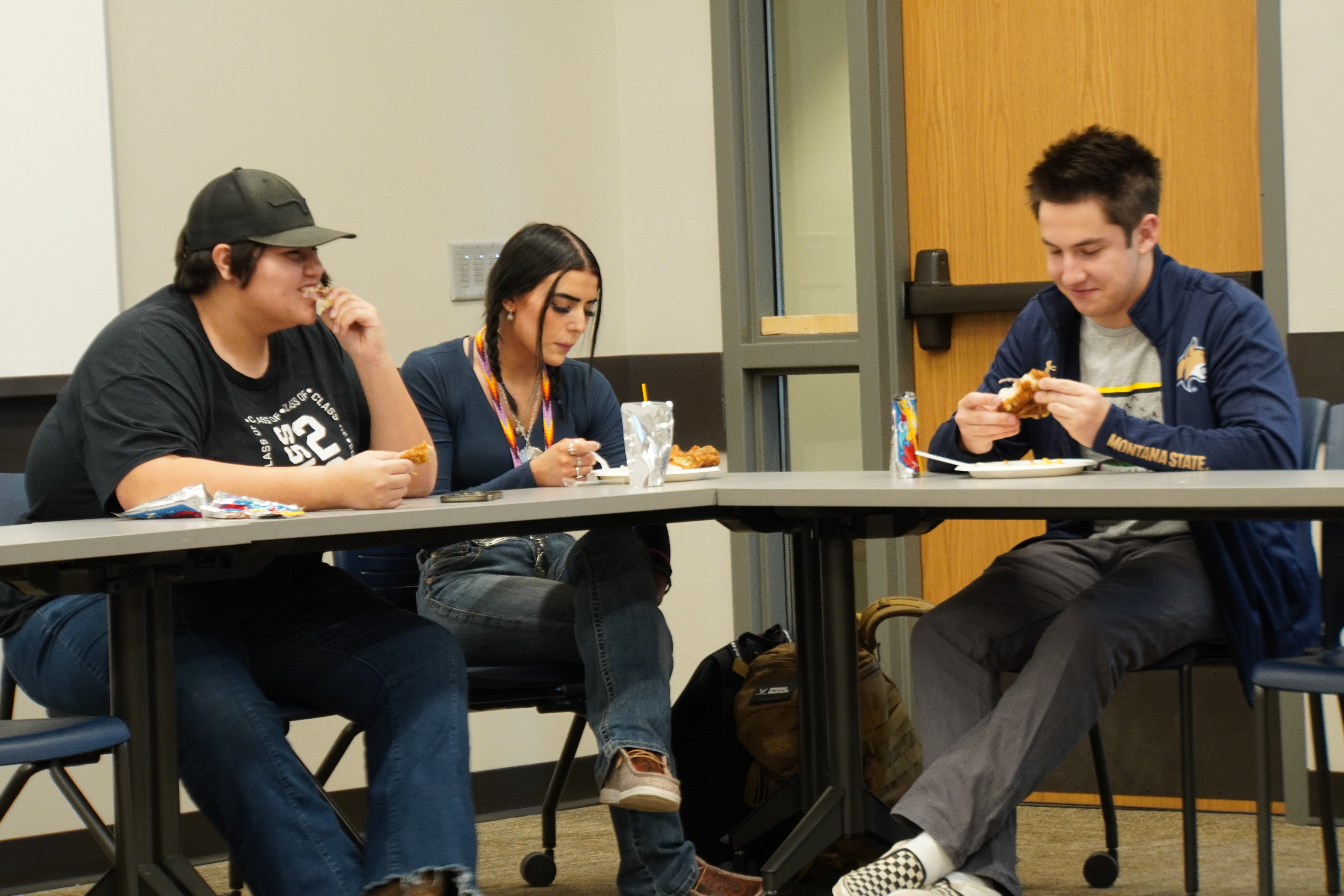 Good Relations students Katherine, Kylie, an Alex, hanging out at the Tutor Night!