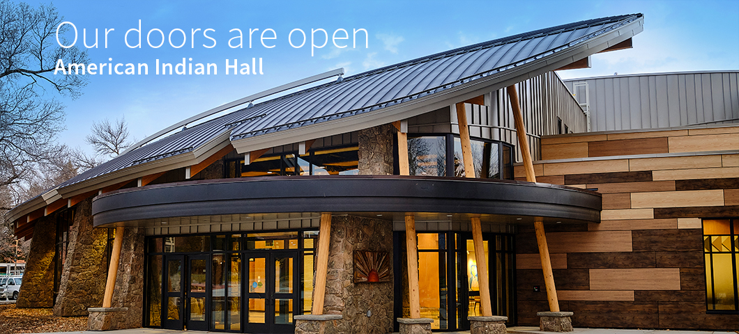 An image of the exterior of American Indian Hall with text overlaid that reads "Our Doors Are Open: American Indian Hall."