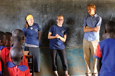 Engineers without borders students work with children in Kenya