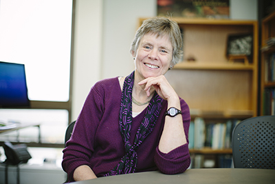 Portrait of seated Cathy Whitlock