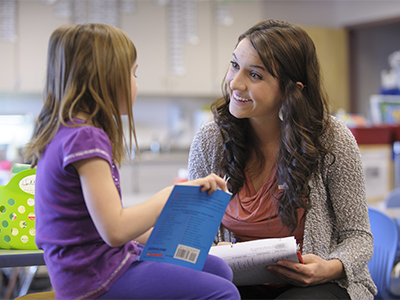 Early childhood education student works with a child