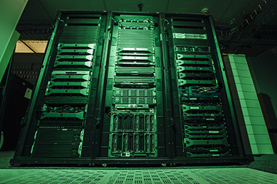 Green-lit photo of computer servers