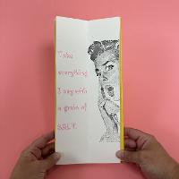 A student's interior page uses a laser cut linoleum form with pink metal typography. 