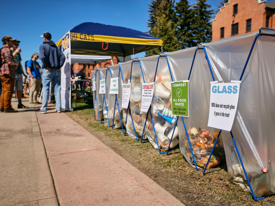 A view of recycling bins along a walkway