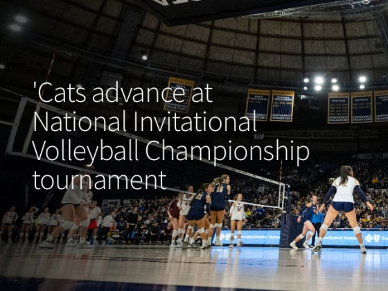 A college volleyball match in play. | MSU