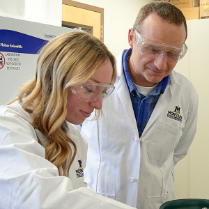 professor with student in lab