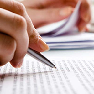 Image of someone correcting text.
